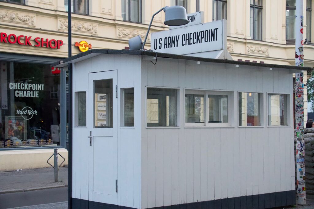View of the iconic Checkpoint Charlie guardhouse in Berlin, Germany.